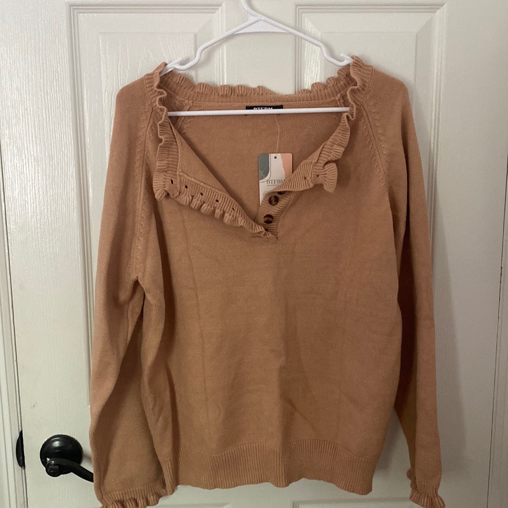 Frilly salmon colored sweater